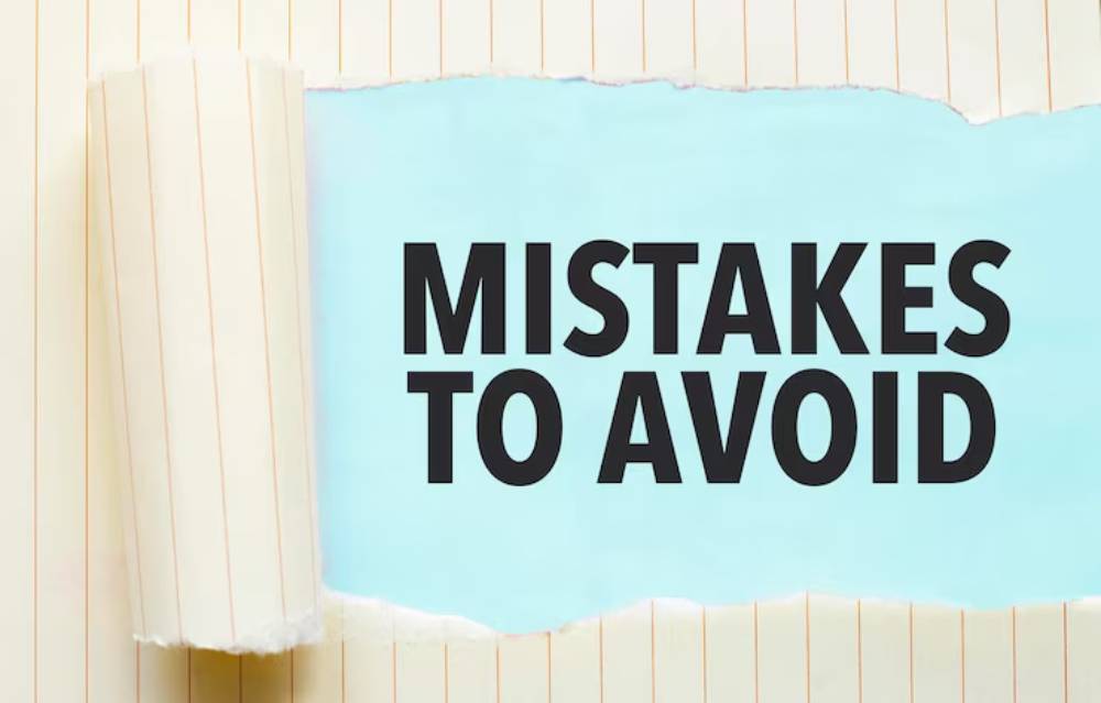 Text on a torn paper background reads 'MISTAKES TO AVOID' highlighting common pitfalls to steer clear of.